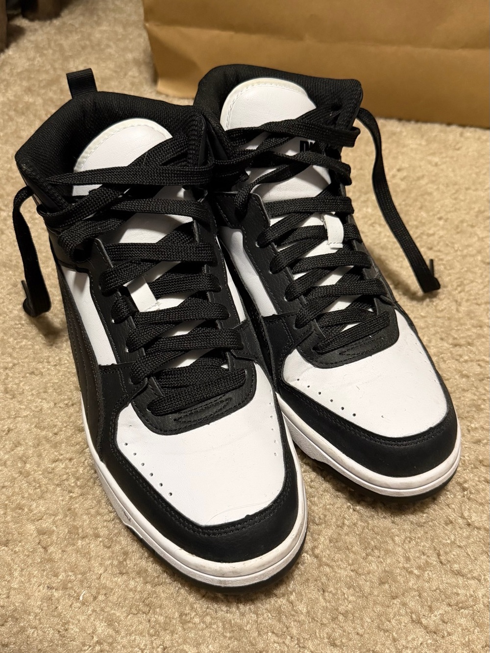 Black and White Puma High-Top Sneakers